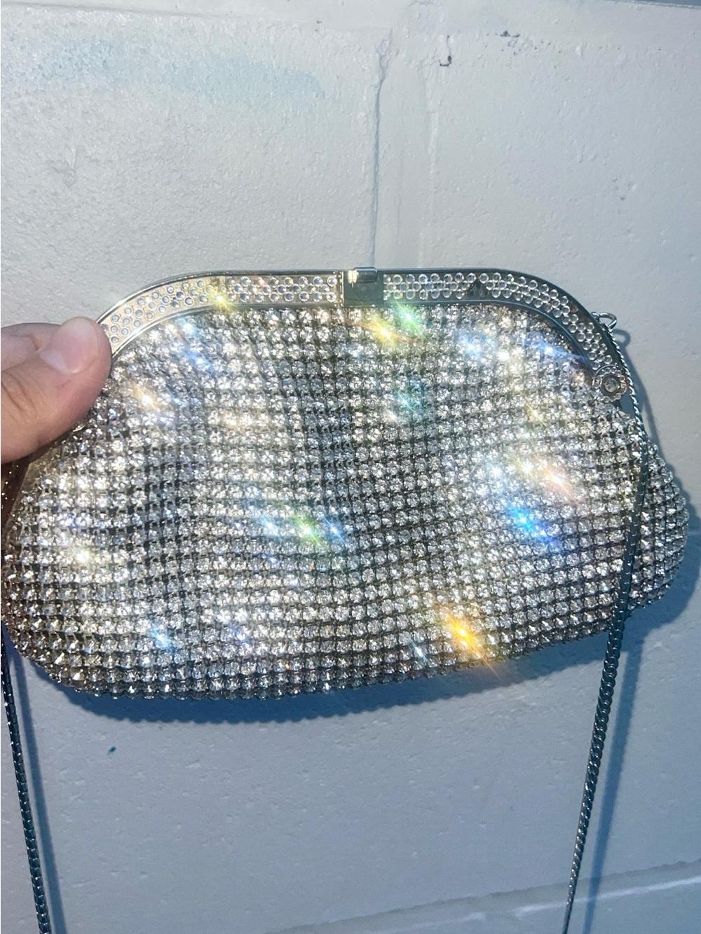 Vintage silver crystal mesh evening clutch with embellished rhinestones.